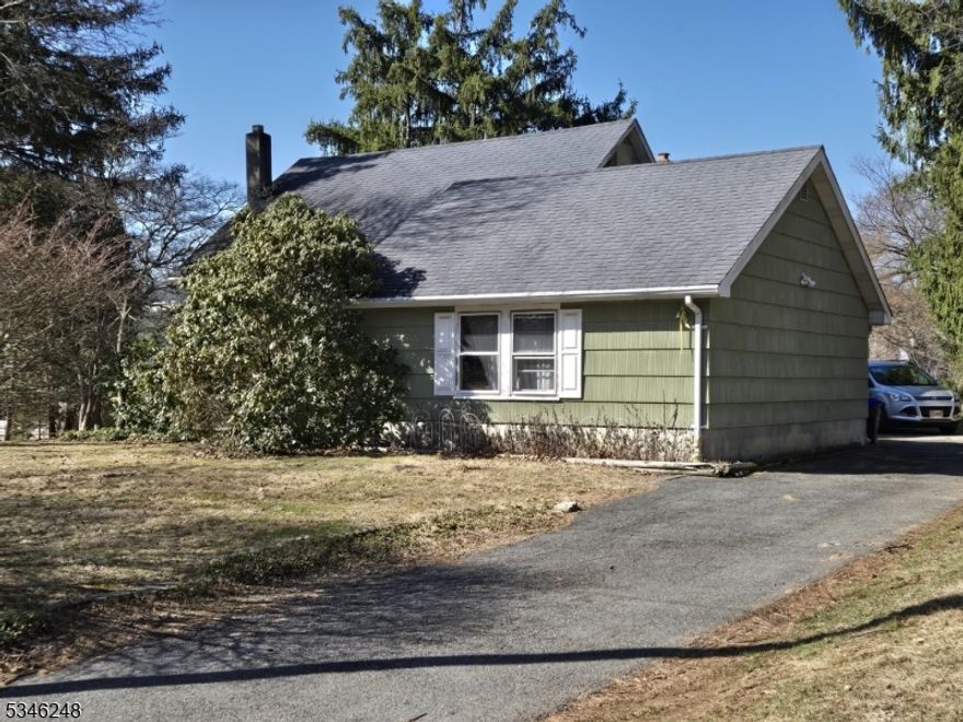 Estate Sale.  Great opportunity to own this three-bedroom, two bath Cape Cod with sunroom, dining room, enclosed porch, two bathrooms, pull down attic and full basement on a level lot on half an acre in desirable Randolph with phenomenal schools.  House has hardwood floors throughout under carpeting. There is an attached two car garage with a loft for additional storage and parking for eight cars. Endless Potential for first time buyers or investors.  Easy access to all major highways, such as Routes 80, 10, 46 & 206 as well as restaurants, shopping, parks and low taxes. House is being sold strictly "As Is."  Buyers/Investors to do their own due diligence, CO, water etc. Seller accepted offer.  All other offers are back-up offers.