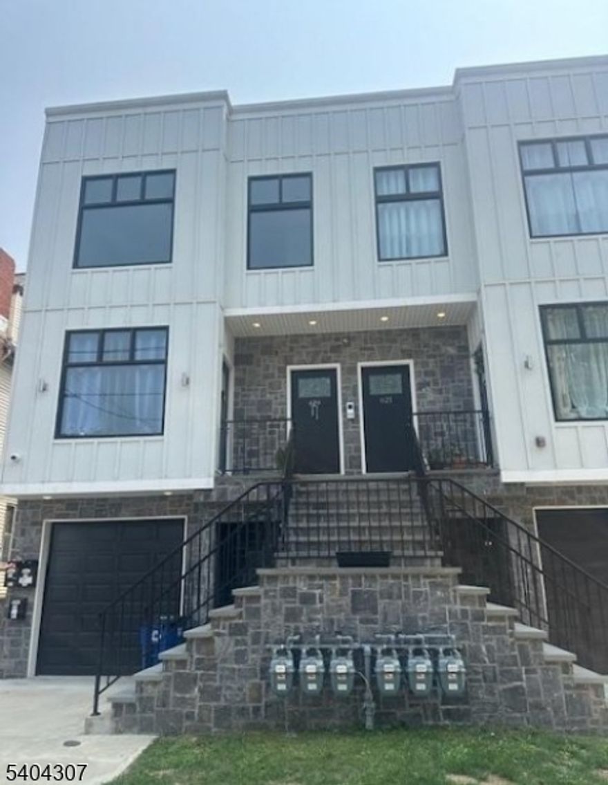 Welcome to this bright and spacious 3-bedroom, 2-bath apartment located in a quiet residential area of Paterson City. This well-maintained unit features a functional layout with 5 total rooms, in-unit laundry, and cooling provided by one unit for added comfort. The property also includes a garage and an additional parking space, offering rare and valuable convenience. Offered unfurnished and available for immediate move-in, this home is perfect for those seeking space, comfort, and practicality.