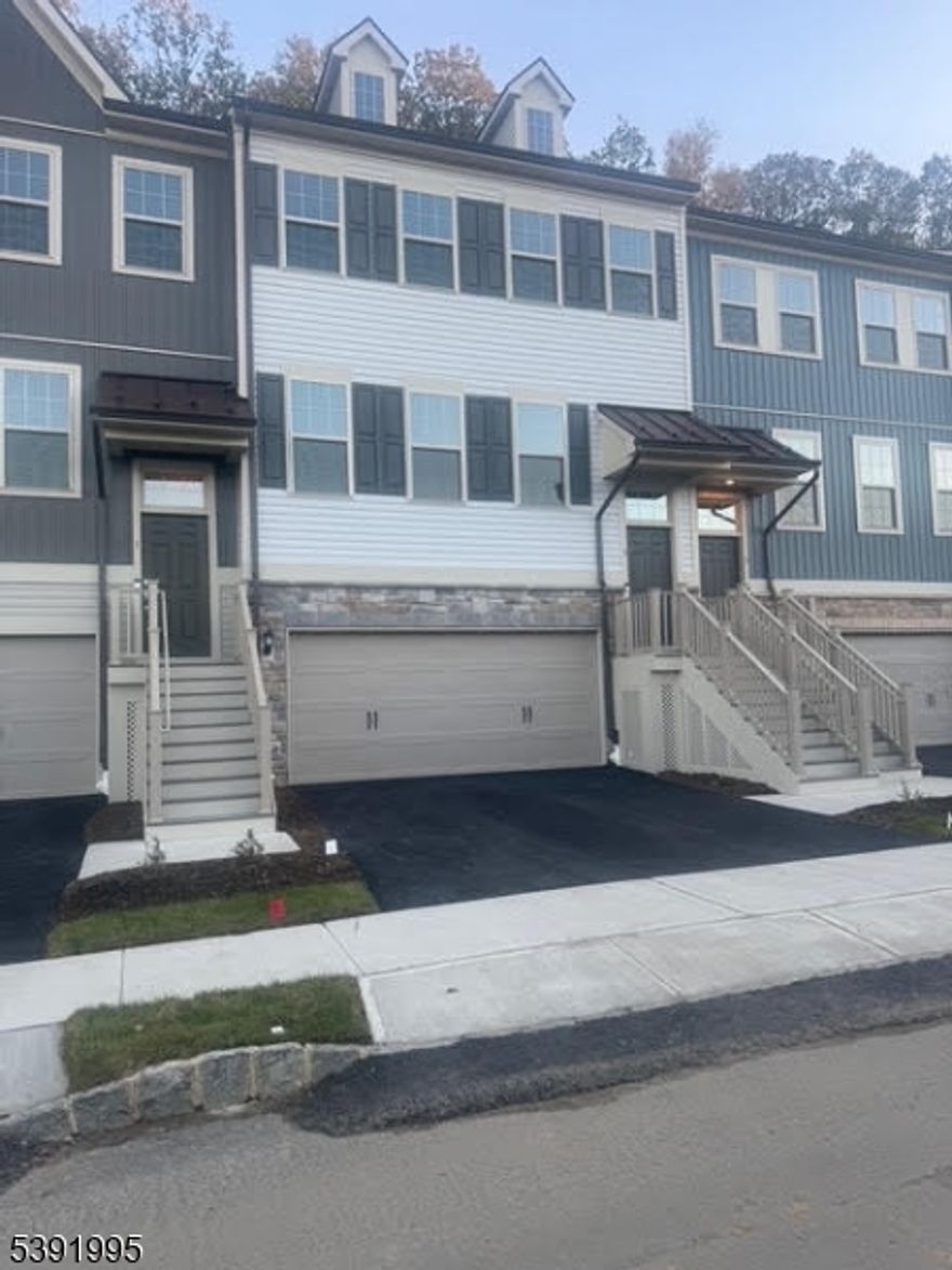 FOR RENT! NEW CONSTRUCTION MOVE-IN READY VERY SPACIOUS (Approx. 2,400 Sq. Ft.) INTERIOR UNIT TOWNHOME, located in the Very Desirable Union Hill, Denville Twp. BEAUTIFULLY DESIGNED ON THREE LEVELS, INCLUDING A FULLY FINISHED SELF-CONTAINED BASEMENT. ALL WOOD FLOORS THROUGHOUT THE HOUSE, INCLUDING THE STAIRWAYS. PETS ARE ALLOWED. THE LARGE FULL BASEMENT HAS A FULL BATH, AND WOOD FLOORS THROUGHOUT. PETS OK! THIS GORGEOUS MASON RIDGE DEVELOPMENT TOWNHOME, IN A NICE DENVILLE TWP, IS LOCATED ON RT 10 WEST, ADJACENTLY  ACROSS A QUAINT SHOPPING STRIP - The SHOPPES AT UNION HILL, for your Morning Coffee, Relaxation and Shopping Hangouts at familiar High-End Stores and Eateries - such as Trader Joe, Panera Bread, QDOBA, JoSABank, Banana Republic, Five Guys, Sephora, Loft, GAP, Starbucks, Talbots, Scenthound, LaserAway, LA Bikini, J.Jill, Janie and Jack, Club Pillates, Chico's, Athleta, Warby Parker, Bluemercury and other Specialty Tech and Accessory shops, etc.This townhome has easy access to NYC by Road or Train. It is approximately 40 minutes and 45 minutes drive, respectively, through either of Routes 287 and 8O, and only about 12 minutes to Morristown Train Station to NYC, and less to Mt Tabor NYC Train Station. Close to Top rated Denville Elementary, Middle and Primary Schools, Equally accessible to several other Morris County Shopping and Entertainments Hubs, and beyond.