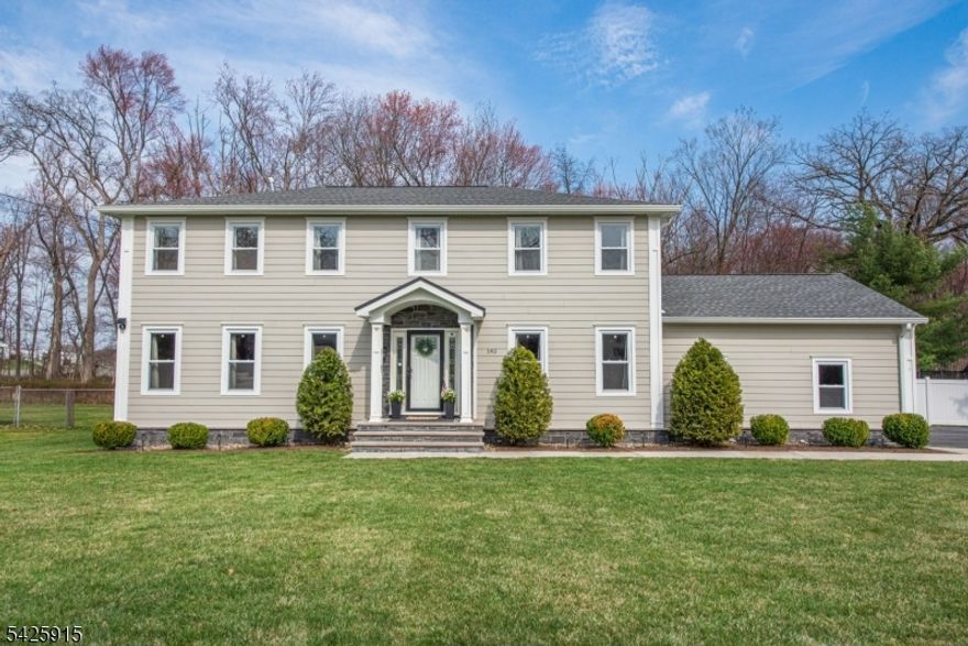 Welcome to 142 Crescent in Florham Park - a fully renovated, move-in ready 4-bedroom, 4.5-bath Colonial that perfectly blends modern comfort with timeless design.Set on a flat, fully fenced property backing to a peaceful wooded area, this home offers exceptional privacy along with a beautifully designed outdoor space featuring a spacious deck, a high-end playground, and plenty of room to relax or entertain.Inside, the open-concept layout is ideal for both everyday living and hosting. The main level includes a formal dining room and a stunning kitchen with a center island, breakfast area, and a stylish dry bar, all flowing seamlessly into the main living spaces.Upstairs, the primary suite is a true retreat, complete with a walk-in closet outfitted with custom shelving and a luxurious bath featuring a double vanity and oversized walk-in shower. A private en-suite bedroom provides the perfect guest, while two additional bedrooms share a well-appointed hall bath with a double sink vanity and shower over tub.The fully finished basement adds incredible versatility, offering a large recreation room, dedicated office, full bathroom, and laundry area.An oversized two-car garage and a highly convenient location near shopping, major highways, and everyday amenities complete the package.