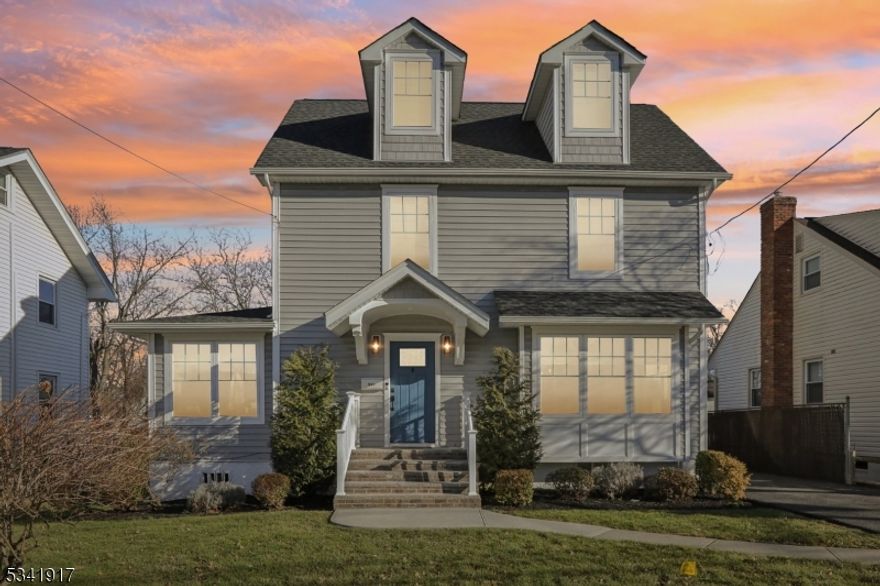 This meticulously renovated 4 Bed/2.2 Bath home w/ thoughtful owner improvements spans 4 levels of finished living space. The open-concept main level makes living & entertaining easy!  Nodding to the bygone era of the home's original construction, a farm-style sink was installed in the expansive center island of the gourmet kitchen. There's always plenty of room to gather at counter and breakfast nook. Built-in stainless steel appliances, tough quartz countertops and crisp white cabinetry w/ abundant storage complete the fresh aesthetic. The comfy living room focal point is a clean burning GAS fireplace which is accented by a modern natural stone surround. The spacious dining room & convenient powder room complete this level.  Upstairs, The primary suite has been enhanced w/ custom closet systems, premium blackout shades and a spa-inspired ensuite bathroom w/ twin vanities. All the other bedrooms also have custom closets. Outdoor living  spaces were enhanced w/ professional landscaping where privacy trees now line the back fence and a new Cambridge paver patio was installed to create a tranquil retreat for a fire pit. Fully finished basement!!  Cordless Hunter Douglas window treatments throughout the home; 2-zone HVAC, refinished HW floors, +++ Prime location offers WALKABILITY to top-rated schools, vibrant downtown shops, restaurants and Westfield Memorial Pool with parkland. Easy NYC train access. Perfect blend of luxury, comfort, & convenience in a desirable neighborhood.