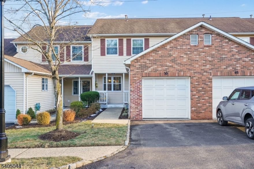 Great opportunity to purchase this 2BR/1.1 bath townhouse. This home features 3 full levels of living space with loads of natural light. Living room provides access out to balcony/deck with a private scenic view. Covered front entry with porch opens into foyer, easy direct access to att garage and into eat-in kitchen w/gas range. The L-shaped living and dining rooms provide perfect space for entertaining. Upstairs two spacious bedrooms share a full bath with dbl sink vanity and ample cabinetry storage. Convenient laundry on second floor includes full size washer and dryer. Lower level walk-out basement affords enough space (24' x 20') for a rec/family room, home office AND exercise area with wall to wall carpeting and sliders out to patio/deck area. Enjoy all the amenities Coachlight complex has to offer including pool, tennis and clubhouse. This home has been very nicely maintained, just needs some updating in kitchen and baths. Sq ft does NOT include walkout LL rec room. Buyer to confirm assoc fees and pet rules with management co.