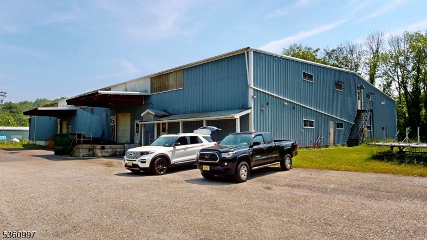 Rare opportunity to purchase a very large warehouse on 20+ acres within Sussex County, NJ with a FAVORABLE CAP RATE. The building, surrounded by residential/agricultural, features over 50,000 square feet of space, all which is connected internally; 45,000+ square feet on the ground floor plus 4,000+ mezzanine. The main warehouse is located in the rear.  Don't let the outside pictures fool you. The inside is impressive. Over 35,000+ square feet is open warehouse space with ceilings up to 23' (see floorplans), plus 10,000+ square feet of storage/office/kitchen/restroom space. Loading docks include both flush and drive-in. The current Tenant (lawn care equipment) has been in business for nearly 50 years with a lease into 2029 and 3.0% annual increases. Past uses include Manufacturing, Packaging/Repackaging, Warehousing, and Distribution of Equipment, Products, Food, and Distillery. Zoning permitted uses are vast (see ordinance).