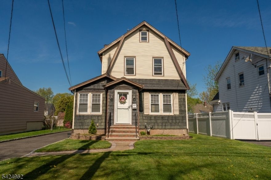 Welcome to a well-kept Colonial in the heart of Union, where classic charm meets everyday convenience. Set on a quiet residential street, this inviting home offers a warm and functional layout designed for comfortable living and easy entertaining. The main level features a sun-filled living area with beautiful hardwood floors, a formal dining space, and a kitchen with great flow for daily use. A dedicated office adds flexibility for remote work or a quiet retreat. Upstairs, you'll find three comfortable bedrooms and a full bath, offering a practical and private layout.The finished basement expands your living space with a rec area, full bathroom, laundry, and utility room?ideal for guests, hobbies, or additional storage. Outside, enjoy a spacious deck overlooking the backyard, perfect for entertaining or unwinding outdoors. A detached two-car garage and long driveway provide ample parking. Conveniently located near shopping, dining, schools, and major roadways for an easy commute.