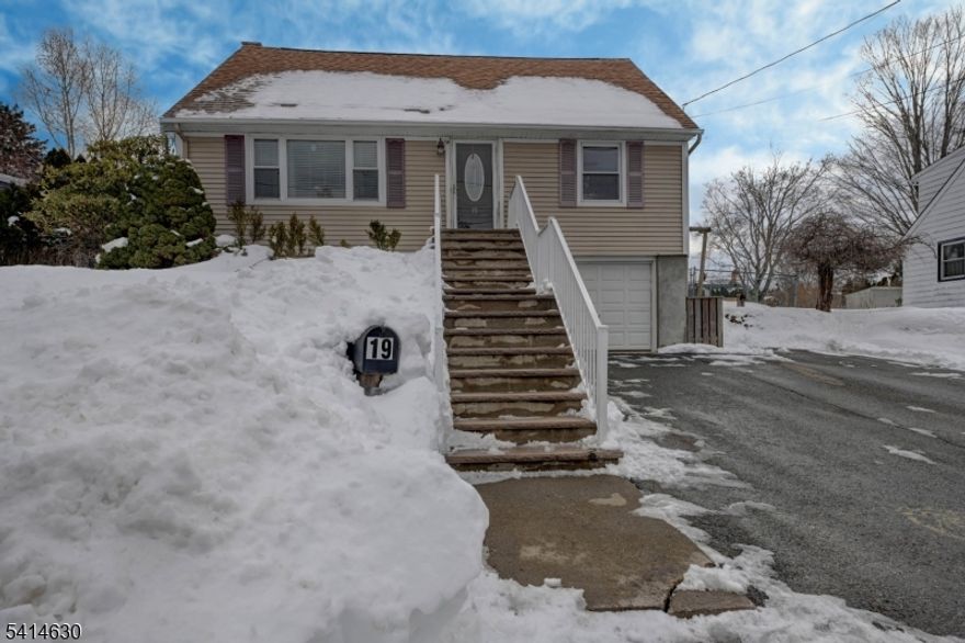 Four bedroom, 2 bath Cape Cod home with lots of warmth and charm. Nice open floor plan on first floor with the kitchen open to the living room. Two bedrooms and full bath on first floor complete the downstairs. All hardwood floors. Two bedrooms and a full bath on second floor with new vinyl wood floors upstairs. Primary bedroom on second floor features a walk-in closet. Finished basement boasts a family room with a bar area. Garage with inside entrance. New forced air unit coil, furnace and condenser. New roof in 2021. New refrigerator. All appliances included. Note: Large fenced in backyard with an outdoor porch/deck area that is great for entertaining. New wood ceiling with six 4" LED lights added to covered deck with a fan. Cul-de-sac street. Great location. Don't miss this one; you won't be disappointed! Easy commute to NYC. Close to parks, schools, houses of worship & major highways.