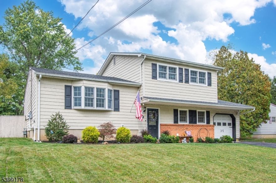 Absolutely Stunning & Fully Updated Split-Level in One of the Area's Most Sought-After Neighborhoods! Prepare to be impressed by this meticulously maintained 3-bedroom, 2 full bath split-level home offering exceptional updates, outstanding flow, & true move-in-ready appeal. From the moment you enter, you'll appreciate the warmth of the gorgeous hardwood floors, thoughtfully designed layout & seamless connection between living spaces. The heart of the home is the expansive, beautifully updated eat-in kitchen, featuring high-end cabinetry, premium appliances, generous counter space-perfect for everyday living & entertaining. The laundry room offers the potential to be converted into a 4th bedroom or office. The home's flowing floor plan provides comfortable separation of living, sleeping, and gathering areas while maintaining an open, inviting feel. The private backyard, ideal for entertaining, gardening or peaceful relaxation. Whether hosting friends or simply unwinding, this outdoor space offers the privacy & comfort you're looking for. Newer roof and AC & upgraded electric and plumbing, giving you peace of mind for years to come. The 1-car garage adds convenience, storage and additional functionality. Located in a highly desirable neighborhood known for its charm, community feel & well-kept homes, this property stands out with its beautiful decor, top-tier updates & meticulous care. Truly a must-see home that checks every box! Public water/sewer & natural gas. Just unpack!