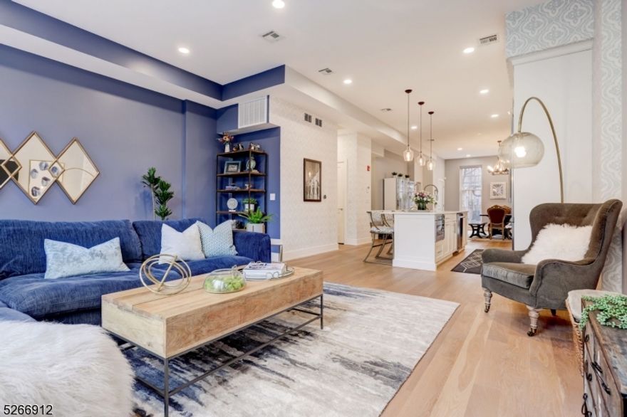 Introducing an extraordinary luxury triplex brownstone condo in prestigious Hoboken, NJ. With over 2,100 square feet of living space, come inside to discover an open floor-plan layout on the main floor, accentuated by soaring 10 ft ceilings.The high-end SS appl and gourmet kitchen with quartz countertops make a stunning statement. Floor-to-ceiling windows flood with natural light and provide access to private backyard oasis from every room. Complete with an outdoor kitchen, this is the ultimate space for outdoor entertainment. This smart home is equipped with state-of-the-art technology. With 3bd and 2.5ba, incl radiant heated floors, this home provides a luxurious retreat. Custom walk-in closets offer ample storage space, and the lower evel finished basement is perfect for recreation, accommodating guests, or setting up a home office. Designer light fixtures, on-demand water tank, ensures hot water whenever you need it. Located on the highly desired, convenient Garden street in Hoboken!