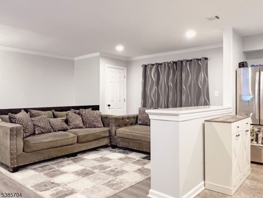 Gorgeous 1 bedroom 2nd floor rental in sought after Flemington South. As you enter the front door, steps are in front of you. Walk up those steps to a warm, inviting living room/dining room combo. Updated kitchen (all new appliances) and bathroom to the left and a huge bedroom with one huge closet with two entrances. Balcony with no units across the street which affords more privacy. Thermal windows and doors which will keep the gas and electric bills down. No pets allowed. Blackout/motorized /bluetooth controlled blinds. Free access to different swimming pools. Private basement with laundry facilities and storage area. HOA is paid by the landlord, as is the sewer bill.