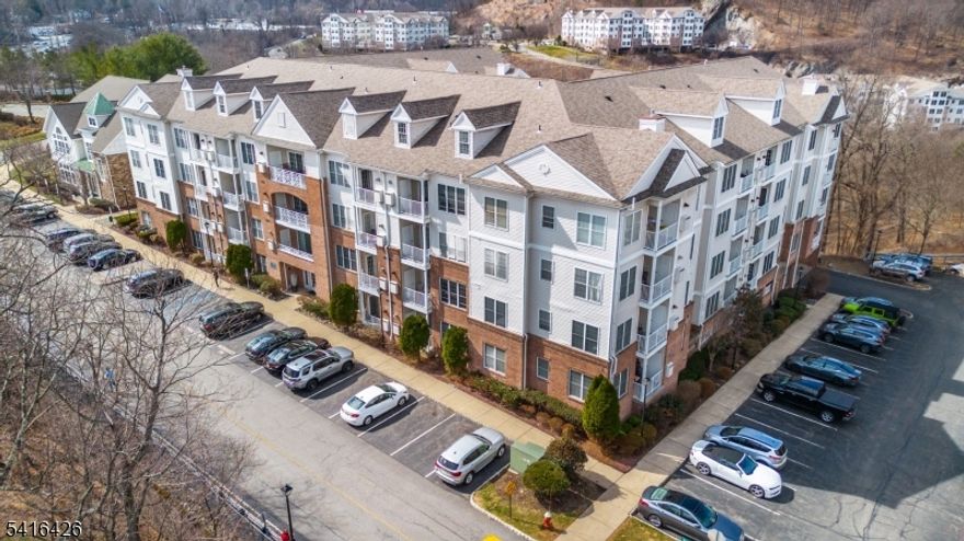 Bright 4th-floor corner penthouse condo with 2 bedrooms, 2 bathrooms and a versatile loft. Offering a generous 1,553 sq ft, this unit features new wood floors, a new washer/dryer, center-island kitchen, walk-in closets, and a gas fireplace. The loft is ideal for an office, lounge, or guest space. Enjoy the private balcony, one assigned garage space plus outdoor parking, and amenities including 2 clubhouses, 2 pools, tennis courts, and a gym. Max 2 pets (35 lb limit). Close to highways, shopping, and dining.