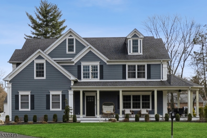 Nestled in a private cul-de-sac on the south side of Scotch Plains, this newer custom-built home, completed in 2021, offers an exceptional interior with a sprawling professionally landscaped property. A stunning wrap-around porch welcomes you in the home as you are you're greeted by an open, airy layout with gleaming hardwood floors throughout. Highlights include a living room, dining room & a spacious family room located at the back of the house with a wood burning fireplace and sliders out to the backyard. The chef's kitchen is designed for functionality and style, featuring two ovens, granite countertops, custom cabinetry, and high-end stainless steel appliances. Welcome to the second floor, which boasts an impressive layout featuring 4 spacious bedrooms and three full baths. The primary suite is a true retreat complete w/ 2 walk in closets and a luxurious primary bath featuring a separate stall shower and a soaking tub providing ultimate relaxation. Two additional sizable bedrooms share a well-appointed hall bath equipped w/ a tub and a double vanity. The 4th bedroom stands out w/ an ensuite bath offering both privacy and comfort. As you ascend to the upper level, you'll discover a versatile fifth bedroom or office that includes a full bath. The basement is equally impressive, featuring high ceilings that enhance the spacious feel and create the perfect environment for recreation and entertaining. NJ transferable home warranty!