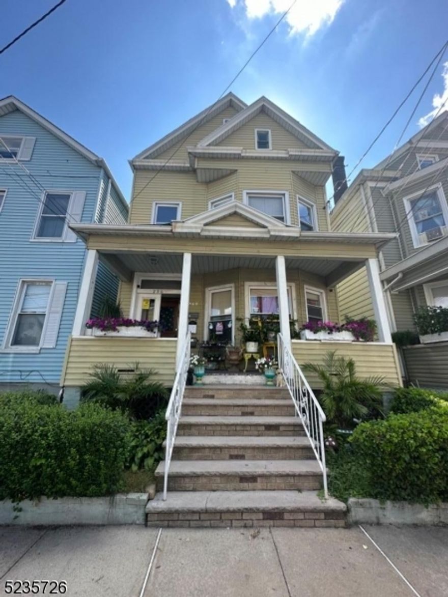 A beautiful  2 family home in a convenient location. Close to everything .It has 3 bedrooms in each unit and a full half finished  attic .