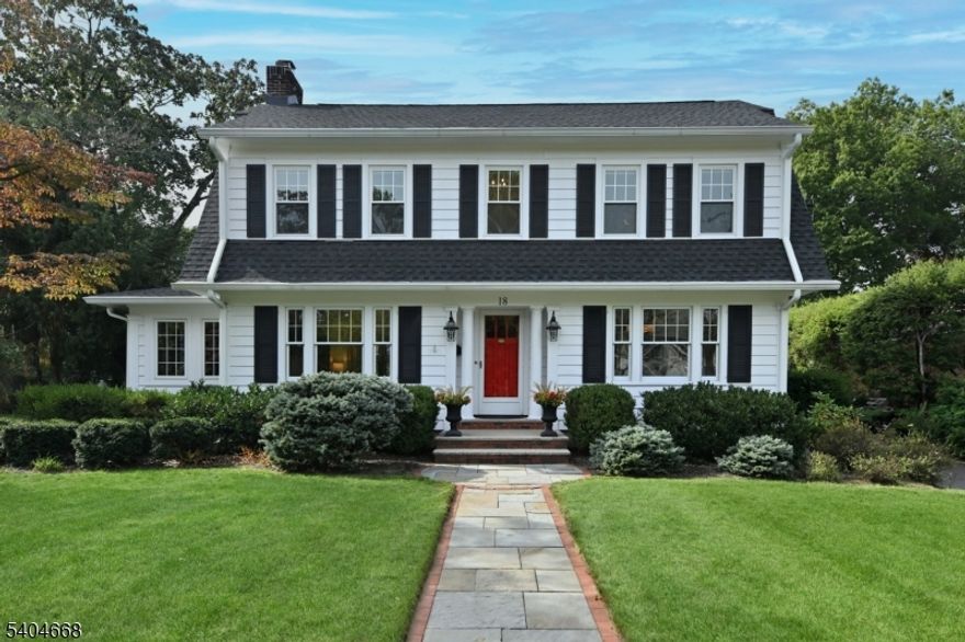 Beautifully-updated Center Hall Colonial set on an impressive 221' deep level lot on quiet street combining classic charm with extensive high-end upgrades. Foyer view to stunning LR with gas fireplace.  Gracious and spacious dining room.  1st floor family room, office/den, powder room, custom eat in kitchen with quartz counters, pantry, stainless steel appliances, eating area and mudroom. 2nd floor primary bedroom with WIC/office and dual access newer bathroom, 2 additional bedrooms.  Full walk-up attic with high ceiling.  Lower level finished recreation room, laundry and storage.  2-tiered deck overlooks beautifully-landscaped property.  Detached 2-car garage with attached shed.  Short distance to downtown center and effortless commute by train or bus.  Major roadways nearby.  Award-winning school system. Updates include kitchen, bathrooms, heating system, CAC, water softener, elec. panel, many windows, HW heater - the list goes on.