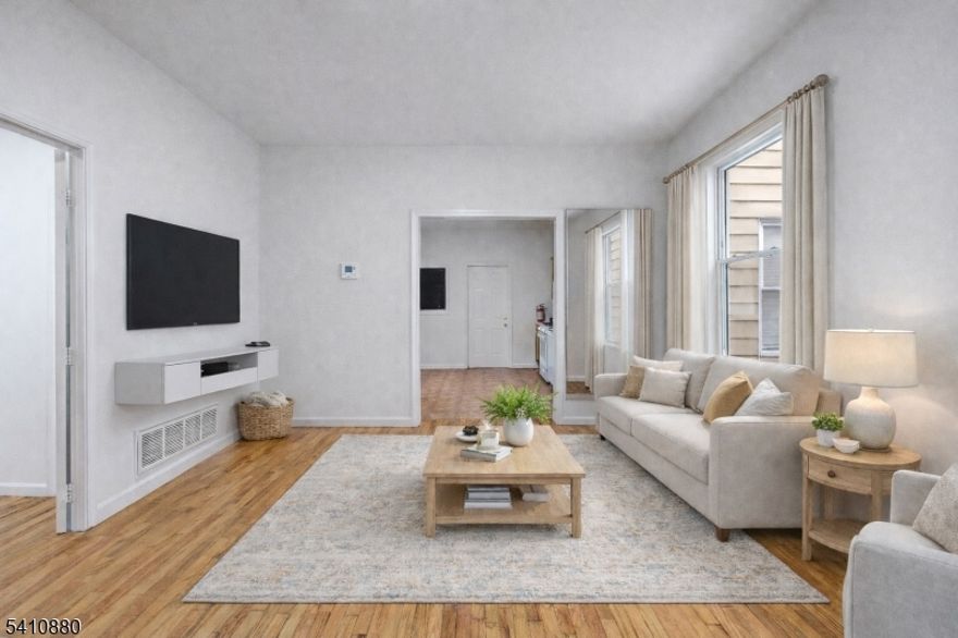 Spacious and accommodating 3-bedroom first-floor apartment located in the heart of Elizabeth, just two blocks off Elizabeth Avenue. This well-proportioned unit features generous living space, an eat-in kitchen, and direct access to the backyard, providing added comfort and outdoor enjoyment. A bonus sun room located just off the primary bedroom offers flexible use as a home office, or private sitting area. Laundry hook-ups are available for added everyday convenience.Enjoy a vibrant neighborhood setting with nearby shops, dining, and daily conveniences close by. A brand-new playground located directly across the street enhances the neighborhood appeal. With a blend of space, functionality, and location, this first-floor rental is a wonderful opportunity for comfortable living.