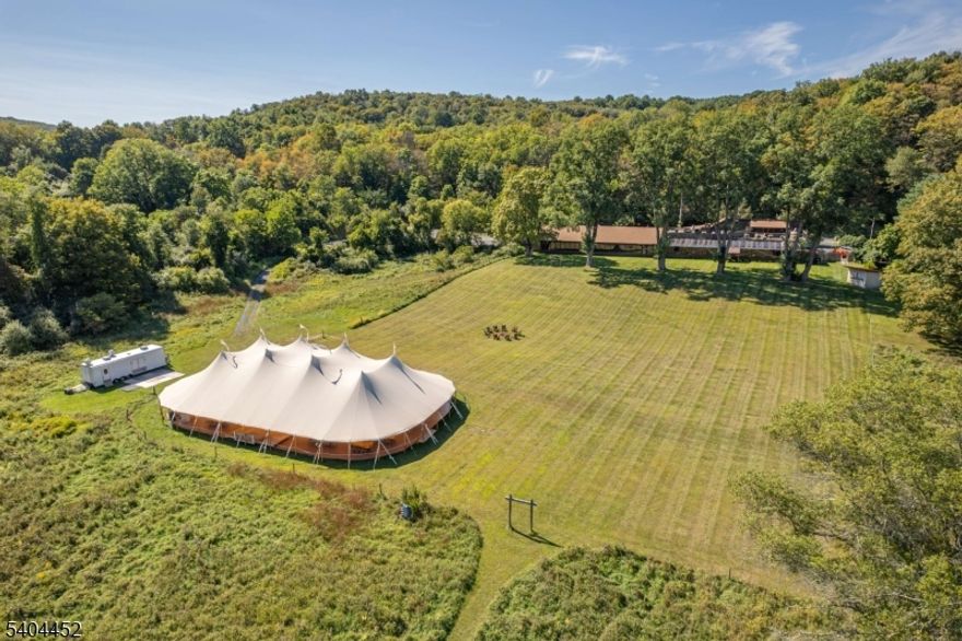 Iconic NJ Restaurant Destination for sale. Owned by the operators since 1949, the restaurant and event facility has been a dining destination for years. Large operating restaurant business and event business that has been thriving for decades. Over 1000 feet of frontage on the Flat Brook River. Surrounded by the 65,000- acre Delaware Water Gap National Recreation Area, this property is a secluded sanctuary with limitless potential. The existing structure offers ample space to build out guest rooms, creating a boutique inn, a premier corporate retreat, or a wedding venue. Open fields and beautiful views, ideal for equestrian use as well. World-class hunting, plus swimming and fishing on the adjacent Flat Brook.