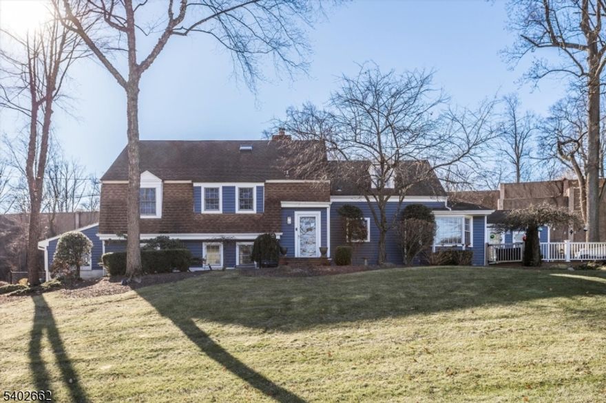 Beautifully updated 5 Bedroom Split Colonial in desirable Cromwell Hills - Spacious Kitchen with access to deck and new fencing; stunning Living Room with wood burning fireplace with built in shelving surround, wall of windows; open to formal Dining Room with access to enclosed porch and deck.  Gorgeous Hardwood flooring thruout; MBR Suite with en suite bath, recently updated, four additional bedrooms, oversize laundry room and renovated main bath.Lower level features porcelain floors with updated powder room and french door access to landscaped grounds with seasonal plantings.  Attached oversize two car garage.  Great community with pool and sports fields - community pool requires membership which is tenant responsibility.  A rare rental opportunity!  Close to Morristown center, shopping, dining, transit - a lifestyle not to be missed!