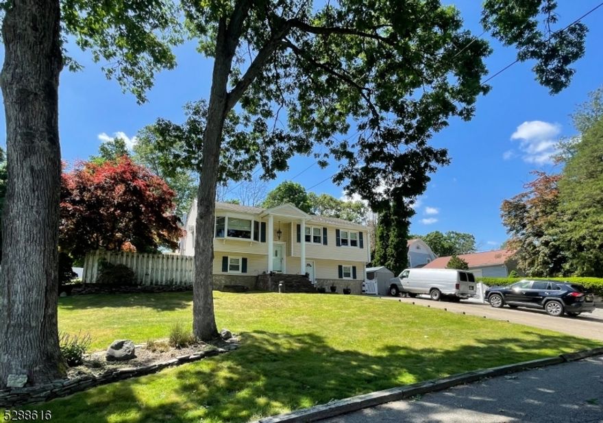 Welcome home to this beautiful Bi-Level home with 4 bedrooms and 2 full bathrooms near Rt 23!  This inviting home has been well cared for and ready for its new owners.  Step inside the light filled living/dining space that opens to the kitchen that has a lot of cabinet space.  Additional 2nd living room with wood burning stove off of the dining room overlooks the in-ground pool and has access to the backyard!   3 bedrooms and a full bathroom complete the first level.  The 4th bedroom, large den with wood burning stove, game room,  2nd full bathroom, and laundry/mud room complete the ground floor.  The game room has walk out access to the lower patio and pool area.  Enjoy a fully fenced backyard paradise with a large in-ground pool surrounded by beautiful paver patio with scenic pond and lower level concrete patio which is ideal for relaxing and entertaining all year round!  The in-ground pool has a new liner.  The property is close to all major highways, shopping, and parks.  Just 1r to New York City with NJ Transit commuter stop located just 1.4miles at the Kinnelon Meadtown Shopping Center!  This one won't last!