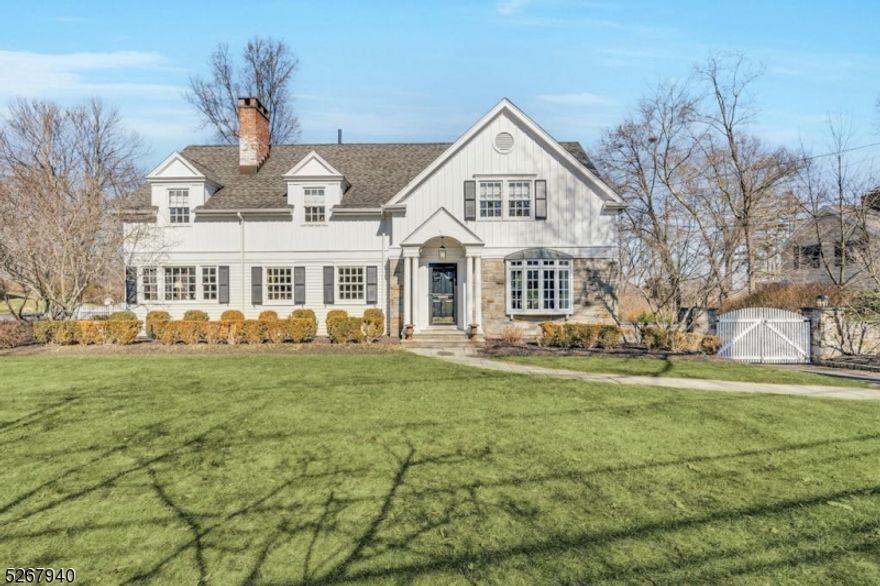 This stunning 4 bedroom, 3.1 bath Colonial was recently renovated by contractor W.P. Lloyd and architect Nick Bensley. No details have been overlooked evidenced by the innumerable architectural finishes and custom design throughout. Upon entering, discover pristine hardwood floors, an inviting living room with wood burning fireplace and an intimate dining room. On this level you will find a first floor bedroom with renovated full bath. Open concept  Kitchen with Quartz countertops and stainless appliances which overlooks a breakfast bar, eating area and stunning Family Room with 2nd fireplace.  This level also features an elegantly appointed office/den with custom built-ins. French doors in the family room lead to magnificent deck, patio, outdoor fireplace and private and completely fenced, professionally landscaped backyard with sprinkler system. The second floor features a primary bedroom with vaulted ceiling, dressing area, spacious closets and spa-like ensuite. Two additional bedrooms with large closets, laundry room with custom built-ins for 2nd office. Lower level is finished with recreation room, mud room, wine closet, powder room, 2nd laundry room, exercise room and ample storage. Access to the two car  garage and walk-out to the backyard.  Close to top-rated schools, downtown Madison, NYC trains, Newark airport and everything this vibrant community has to offer.