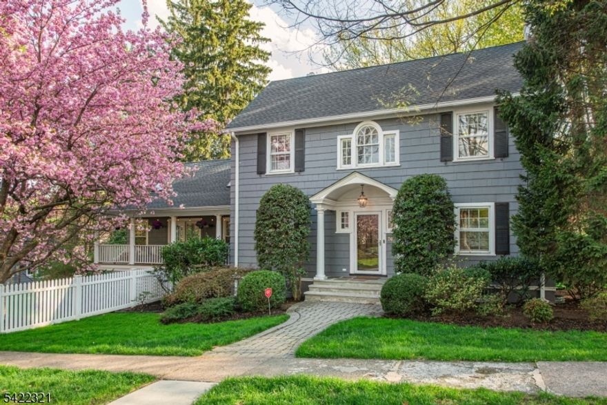 Finally, a house that understands the assignment! This 5-bed, 3.1 bath Colonial has the space, flow, and common sense layout you've been waiting for - because nobody wants "charming" to mean tiny closets and one outlet per room. Formal living and dining rooms bring the classic vibe, while the first-floor office/sunroom gives you options: work-from-home, homework zone, or a place to hide for 20 minutes and pretend you're on an important call. The kitchen opens onto a huge family room with soaring 20-foot ceilings, skylights bring tons of natural light, and enough room for movie nights, holidays, or everyone being together while doing completely different things. You know, real life. Upstairs, the primary suite is the reward for making it through the day, with a walk-in closet and a spacious bath featuring soaking tub, stall shower, and vanity for two. Two more generously sized bedrooms share a Jack-and-Jill bath. Up on the third, two more beds and a full bath. Basement rec room is perfect as a cool hangout, media room, or the grown-up version of a place where no one touches your stuff. And bonus: already plumbed for a future bathroom. The location is a total wow - just a 12-minute stroll to Upper Montclair for restaurants, coffee shops, and schmying. Close to Yantacaw Brook, Brookdale, and Tuers Parks. Easy NYC transportation when duty calls, suburban peace, when it doesn't.