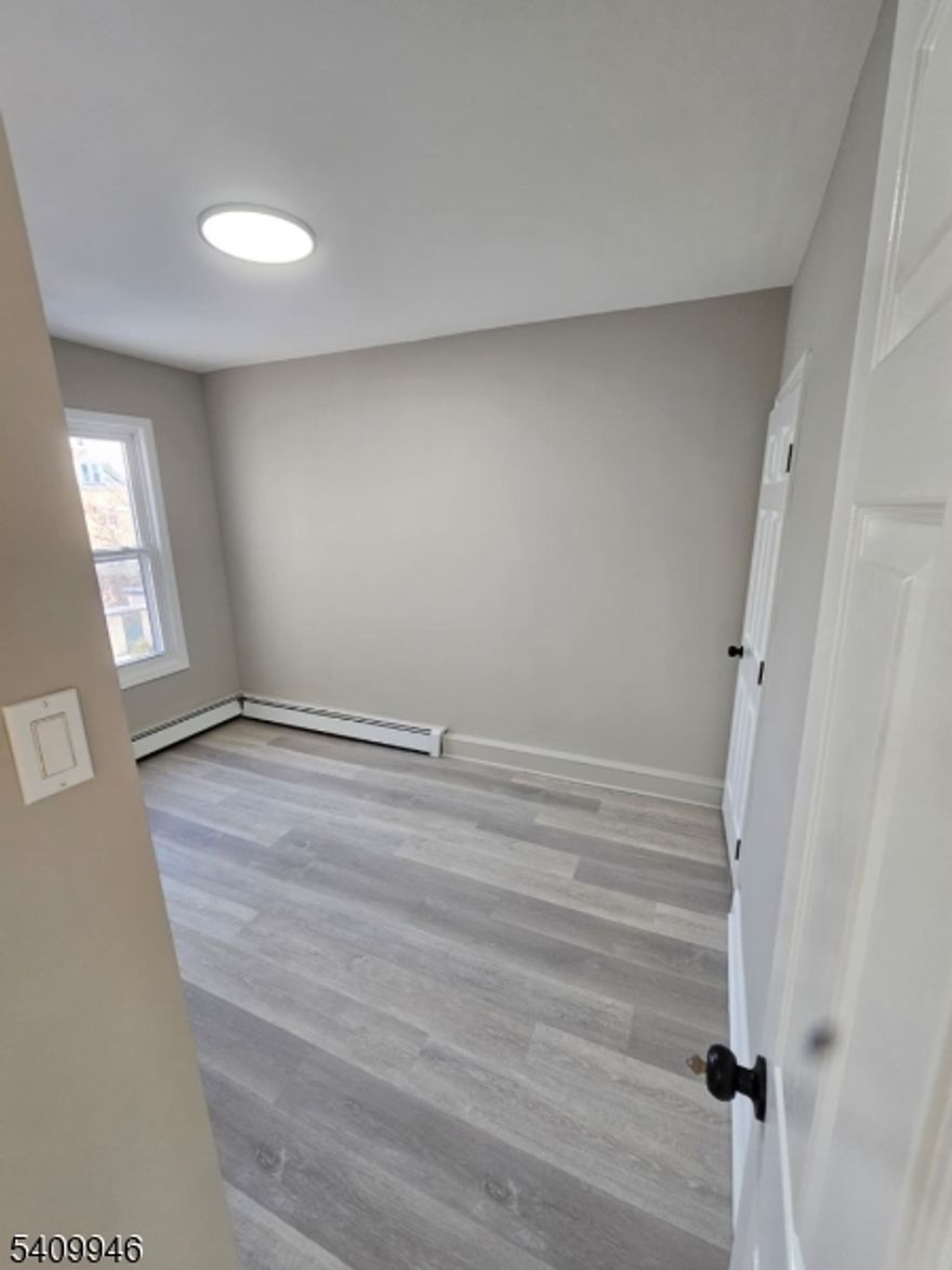 Welcome to this beautifully renovated 3-bedroom, 1-bathroom apartment located in a desirable area of Paterson at 120-122 Lewis Street. This bright and spacious home features a modern open layout with stylish finishes throughout.Enjoy a brand-new kitchen with updated cabinetry, sleek countertops, and contemporary lighting, perfect for everyday living and entertaining. The unit offers generously sized bedrooms with great natural light, along with a fully updated bathroom showcasing elegant tilework and modern fixtures.Additional highlights include new flooring throughout, fresh paint, and a clean, move-in-ready feel. Conveniently located near shopping, public transportation, schools, and major highways for an easy commute.Small pets are welcome, making this a wonderful option for tenants looking for comfort, style, and convenience in a great neighborhood.Don't miss the opportunity to make this renovated space your next home!