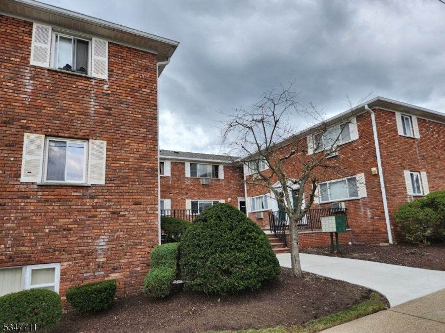 Don't miss this bright and spacious 1-bedroom apartment located in a courtyard-style building right in the heart of town. This inviting apartment offers a contemporary open-concept layout, blending the living room and kitchen seamlessly, perfect for everyday living and entertaining. Hardwood flooring runs throughout, creating a clean and polished look. The bedroom features hardwood floors, oversized windows, a ceiling fan, and plenty of closet space. Expansive windows flood the space with natural light. Unit includes the convenience of assigned parking in a private lot. Incredible value as some of the utilities are included.