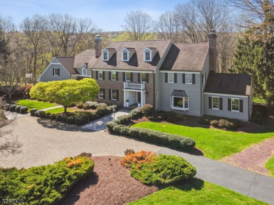 Welcome to resort-style living displayed in this Custom Colonial in the highly sought after Balbrook section of Mendham. Nestled on 5 acres of manicured property next to the Roxiticus Valley, this entertainer's paradise is a true gem. Step into the impressive foyer, leading to the formal LR with high ceilings & one of three fireplaces. The updated FR w/ coffered ceiling flows seamlessly into the spacious Chef's Kitchen, equipped w/ high-end appliances, center island & sitting area. The formal DR, Laundry/Mudroom, Office/Library w/ brick FP complete the 1st level. The relaxing, Primary bedroom features a generously sized custom walk-in closet, office/sitting room, & a luxurious bathroom. 5 other bedrooms, including 1 en-suite, offer ample private space. Lower level boasts a Rec Room w/ built in bar, Gym, Media Room, & a large storage area. Outside, enjoy the private fenced-in yard w/ an inground gunite pool & spa, patio, deck,& fire pit seating area. With close access to all that quaint & dreamlike Mendham has to offer...hiking trails, ice cream shop, restaurants, boutique shopping, B'ville Train, & Morristown midtown Direct Train, this home is a perfect blend of luxury & convenience & memory making opportunities. Mendham boasts a top-rated school system, Hilltop Elementary &  Mountainview Middle School are Blue Ribbon Schools & Mendham HS is one of the few International Baccalaureate World School in NJ.