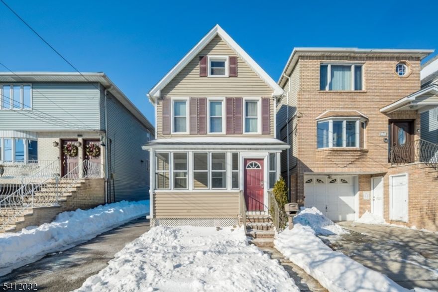 Welcome to 529 Maple Avenue, a cozy home on a deep lot with room to expand and make your own, OR a great investor opportunity! The first floor features a welcoming foyer that leads into a living room and a separate dining room which connects to the kitchen, creating a practical flow for daily life. Just off the main living space, a screened porch offers a great spot to relax, while the large rear patio provides plenty of room for outdoor dining or simply enjoying the yard. Upstairs, the second floor offers three comfortable bedrooms and a full bath. A walk-up third-floor attic adds valuable extra space. The basement provides additional room for storage and laundry. The driveway offers ample off-street parking. Easy access to public transportation, major highways and Newark Int'l Airport. Minutes to wonderful shopping and dining in downtown Elizabeth. Just a short distance to Kean University's educational and cultural offerings.