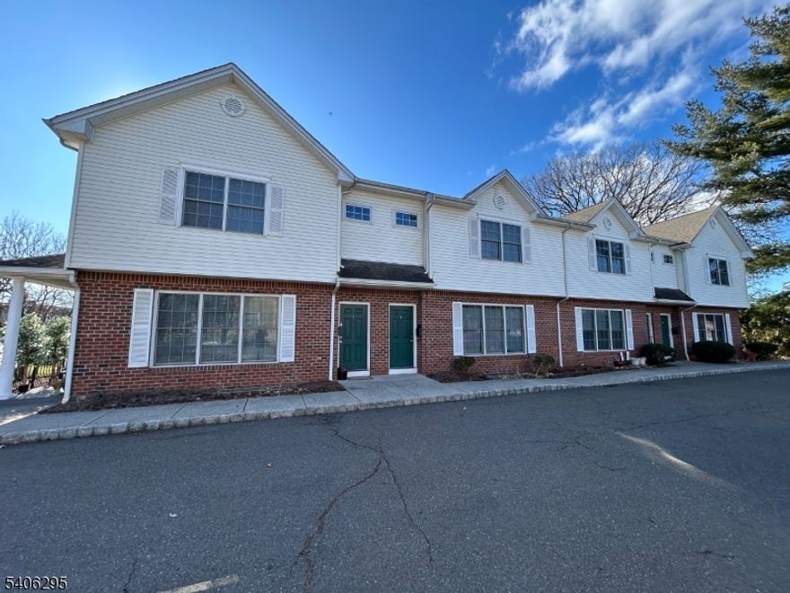 This unit (B) features open floor plan with spacious living room/dining area, modern kitchen and powder room. 2nd floor has master bedroom with master bath, additional bedroom, full bath and separate laundry room. Full, finished basement. There is a small rear patio off kitchen. 2 off street parking spaces. All