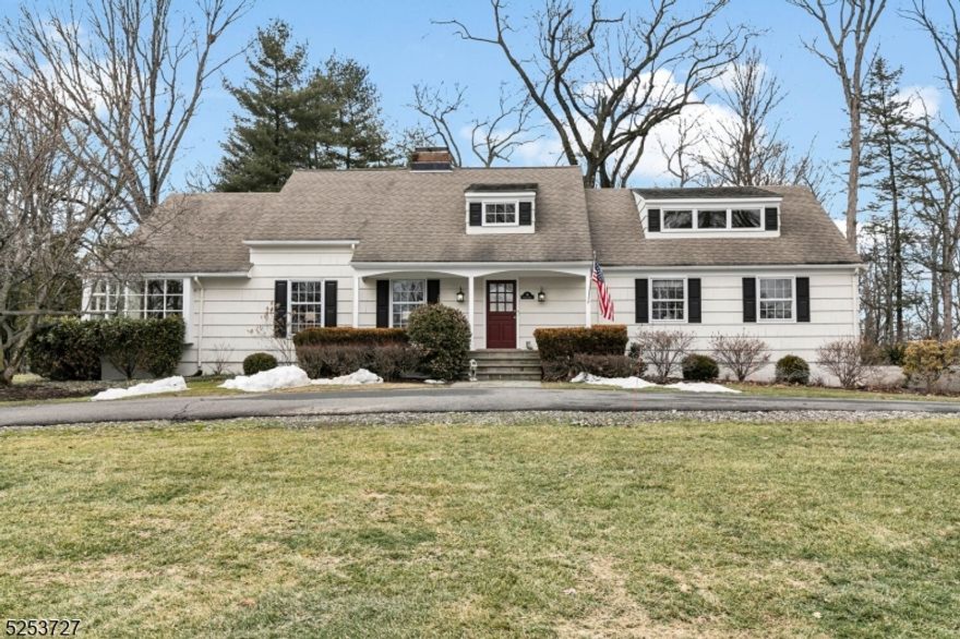 Nestled on an acre in a desirable Basking Ridge neighborhood, this beautifully updated 6-bedroom home offers hardwood floors throughout, bright welcoming rooms, and multiple gathering spaces perfect for both everyday living and effortless entertaining. A charming front porch leads into the lovely foyer that opens to the spacious living room with a wood-burning fireplace. This flows directly into the sun-drenched dining room, filled with natural light from numerous windows. The dining room seamlessly connects to the updated kitchen, which boasts stainless steel appliances, granite countertops, a large center island with seating, prep sink, and storage, as well as an adjacent breakfast area. The family room offers a second brick wood-burning fireplace and sliders to the rear yard. Completing this level are a generous primary suite with an updated bath and walk-in closet, an additional bedroom, home office, full bathroom, and laundry room. Upstairs, an enormous great room offers versatile space, along with two additional bedrooms (one with an adjacent office), and a full bath. The finished basement features a massive rec room ready to customize to suit your needs, plus a full bathroom. Outside, enjoy the deck and large paver patio overlooking the expansive, level lawn. Located in a highly rated New Jersey school district, this exceptional property is just minutes from major transportation, restaurants, and shopping, offering the perfect blend of privacy, space, and convenience.