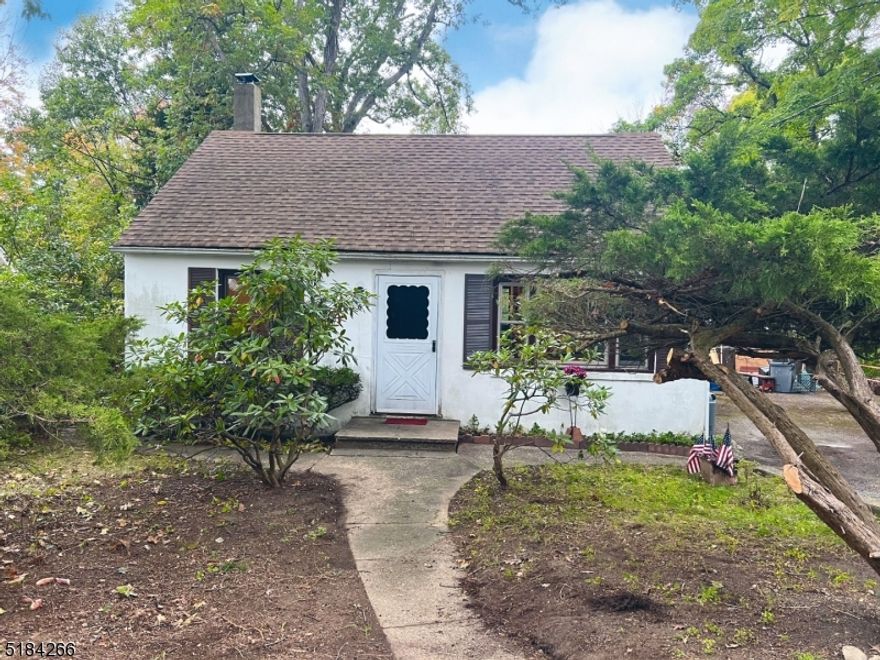 Nice starter home with great potential.  Fresh interior paint,new laminate flooring throughout,new bathroom fixtures. Short walk to East Shore Property Owners Association beach and docks  ( A fee is required.)   The retaining wall has to be repaired or replaced.  New septic is required to be installed. THIS HOME IS SOLD AS IS CONDITION .