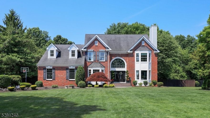 Welcome to resort living in this preferred neighborhood of Warren Township, where every detail of this 4-bed, 3.2-bath colonial showcases elegant design, renovated kitchen and baths, and a lush backyard oasis on a 1.15 level lot and cul-de-sac. Step inside to discover a grand 2-story foyer flanking a private office and a sprawling living/dining rooms. The gorgeous newer chef kitchen features a large center island, designer lighting, quartz counters, marble backsplash, high end appliances, and custom cabinets. The kitchen is open to the expansive 2-story family room that has abundant light and a marble gas fireplace with custom moldings. The second floor offers four generous sized bedrooms, including the primary hotel style suite with high ceilings, a large walk in closet, and a spa like bathroom with double vanity, walk in shower and high end jacuzzi tub, and 2 additional brand new bathrooms. The newly renovated lower level offers a sprawling recreational room for entertaining, a powder room, theater room with all new equipment and speakers, a gym room with mat flooring, and a utility room with storage. This outdoor area is a dream, with a large covered deck with built in seating and lounging, outdoor fans, planters, and speakers, a soothing waterfall, multiple patios, a new hot tub, an in-ground heated salt water pool with new liner, fire-pit area, and gorgeous manicured grounds with beautiful landscaping. This home is TURN KEY!