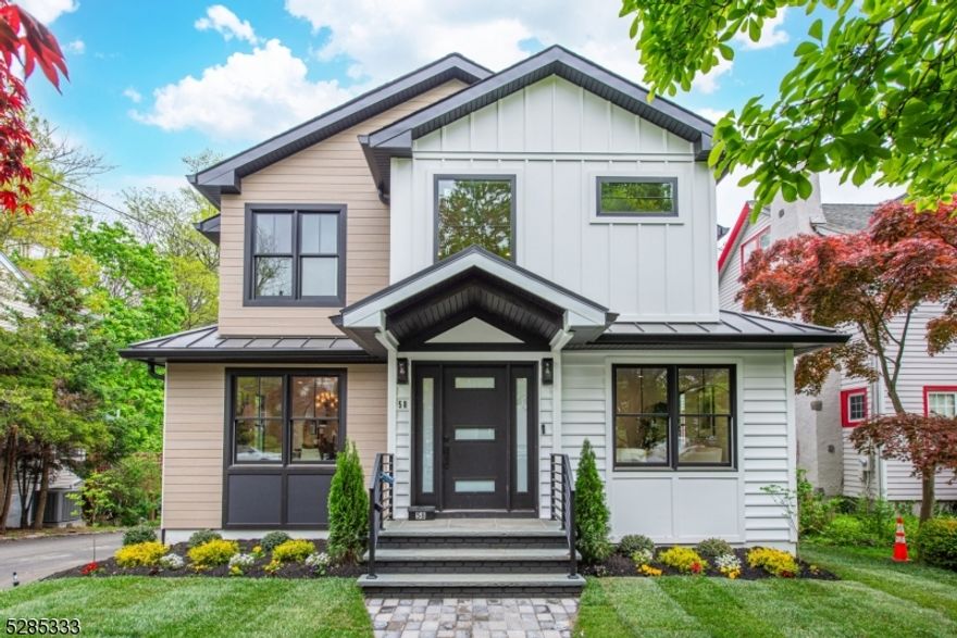 Be the FIRST to live in Millburn's finest newly built modern luxury estate by Champion Estates! Upon entering, you are greeted by radiant herringbone hardwood floors & a two-story foyer that leads you towards a realm of unparalleled opulence w/ elegant designer finishes. Indulge in the heart of the home, a culinary masterpiece chef's kitchen awaits featuring soft-close modern cabinets, top-of-the-line appliances & an expansive 14 foot center island w/ breakfast bar. Luxury is woven into every detail from the exquisite chandeliers & meticulously chosen high-end finishes to the captivating wallpaper. Rounded arches grace the interiors adding a touch of architectural magnificence, while the open-flow layout & warmth of the living room fireplace invites comfort & companionship. An expansive deck off the family room is perfect for indoor/outdoor living while overlooking this 0.23 acre oversized lot with huge backyard. The master suite is a sanctuary of tranquility w/ vaulted ceilings, a private balcony & an ensuite spa bath w/ wet room & double vanity that offers a personal retreat. This home is perfect for generational living with first floor bedroom & full bath and a walk-out basement with full private ensuite, secondary laundry & living area, plus access to finished 2 car garage w/ mudroom. The quality of craftsmanship will give you peace of mind for decades. This is more than a house; it's a masterpiece of living, perfectly situated in one of NJ's most esteemed transit towns.