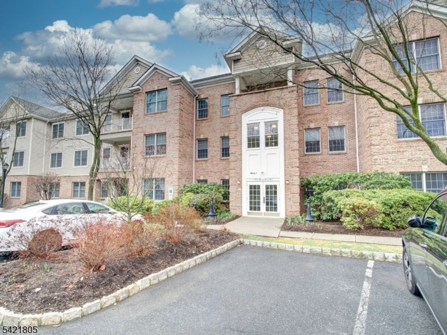 Welcome to desirable Nolan's Ridge Adult Community's Gladstone model....easy, low-maintenance living in this beautifully appointed and spacious 2-bedroom condo. This second-floor end unit offers an open floor plan with a bright and airy feel throughout.Thoughtfully laid out for both comfort and privacy, the bedrooms are positioned on opposite sides of the unit perfect for guests or a home office setup.The spacious primary suite offers a large walk in closet & peaceful retreat with its own private bath. The second bedroom is conveniently located near a full hall bath. Laundry is also located on this side of the condo. A beautifully designed kitchen with huge breakfast bar has beautiful cabinetry, backsplash, corian counters and stainless steel appliances flows seamlessly into a separate dining area, perfect for everyday living or entertaining, and leads to a private balcony ideal for relaxing outdoors. Enjoy the convenience of a garage space with additional storage, along with community amenities that support a carefree lifestyle. Clubhouse with great room with separate kitchen area, gathering room perfect for card games and exercise room. Beautiful outdoor pool with mountain views impress all. Tennis courts are easily accessible for those that want to play. Don't miss this opportunity to enjoy comfort, space, and convenience all in one! Nolan's Ridge is conveniently located just mins to Routes 80, 46 & 10, shopping and restaurants. Please verify all HOA fees with Association.