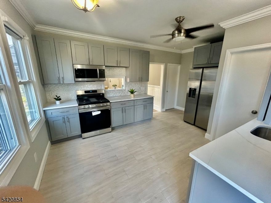 *RIGHT HALF DUPLEX*Stunningly renovated, offering four levels of living space! Featuring 4 spacious bedrooms, 3 full bathrooms, 1 half a bathroom, ample parking, and huge yard, beautiful kitchen with less than 45 mins drive to NY, this attached residential home has it all. (This is a duplex, single family attached home)