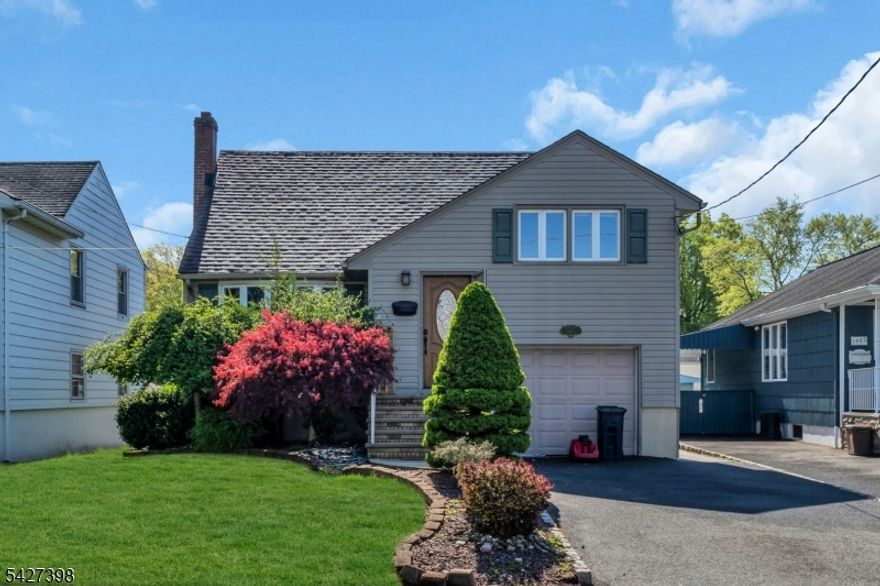 Welcome to this charming split-level residence. This home features 3 bedrooms and 2 full bathrooms, along with a formal dining room and an eat-in kitchen. Throughout the house, you'll find hardwood floors, recessed lighting, and updated bathrooms. The family room, complete with a gas fireplace, offers a cozy gathering space, while a separate rec room or office provides additional versatility. The property includes a basement with high ceilings and French drain. Privacy fencing encloses the beautiful backyard. Come and schedule today!