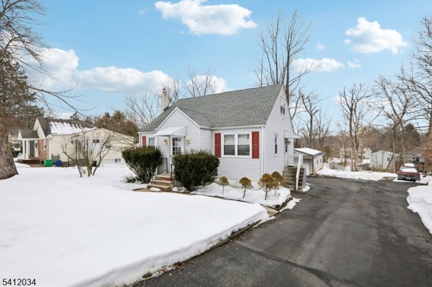 This charming Cape Cod style home in Butler blends timeless design with the kind of flexible layout today's buyers appreciate. Offering 4 bedrooms, 2 full and 1 half bath, there's room to grow, gather, and make it your own. The first floor features a cozy living room, eat-in kitchen, two bedrooms, and a full bathroom mimicking the convenience of one-level living. Upstairs, you'll find two additional bedrooms and another full bath, creating an ideal setup for guests or added privacy. The finished walkout basement adds versatility with a family room, kitchenette, half bath, laundry and utility area, as well as direct access to the backyard. Whether you need a recreation area, or room for entertaining, it's ready to accommodate. Outside, the sizable yard features a deck, ample parking, and a peaceful tree-lined backdrop. The large detached garage provides additional storage or workspace potential. Centrally located near shopping, dining, and major highways, this home delivers convenience, and versatility all in one inviting package.