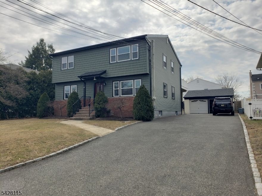 Newly remodeled in 2024 - 2nd floor, 5 room, 2 bedroom, 1 bath apartment with new washer/dryer plus additional 2 tandem parking spots in driveway and plenty of on-street parking. Garage parking/storage negotiable for additional fee. Gas FHA & CAC. Remodeled tiled full bath with jacuzzi tub and 60" vanity. Remodeled kitchen with gas range, vented microwave, dishwasher, tiled floors, high hats, and refrigerator. Kitchen has rear door to new 24x12 deck with steps to backyard. New roof, new siding, new thermo-pane windows, new deck 2024. Very quiet street location. Short distance to NYC transit, local park, and shopping. Hurry, won't last, call today!
