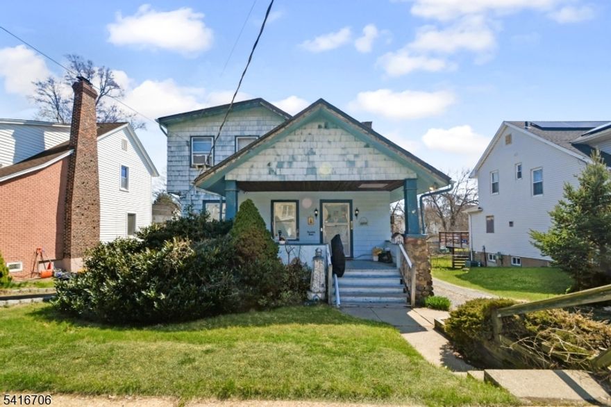 Welcome to 74 Cathedral Ave. Uniquely situated right on the Nutley/Clifton border, this property offers the charm of a Nutley address while technically residing within Clifton.With a little TLC and your personal touch, this property presents a fantastic opportunity to create the home of your dreams. The thoughtful layout includes two conveniently located first-floor bedrooms for easy, accessible living. The living room is centered around a stunning stone fireplace, providing a perfect focal point for relaxing and entertaining. A partially finished basement provides flexible room that can easily be adapted for a home office, gym, or recreation area. Step outside to an expansive yard that serves as a blank canvas, ready to be transformed into your own private outdoor oasis. Don't miss the chance to bring your vision to life in this wonderfully located home. Highest and Best Friday 4/17