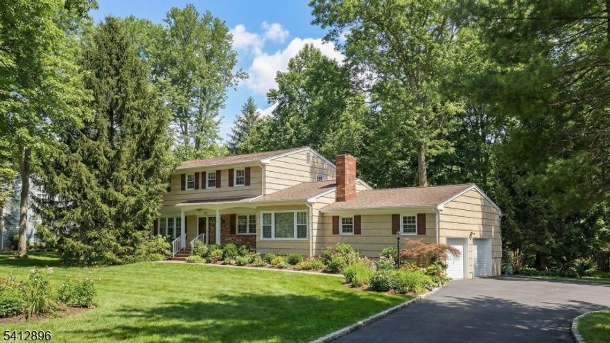 Located in a one of Warren Township's most desired neighborhoods, 21 Lenape Trail offers timeless colonial charm set on a beautiful 1.5-acre lot. Step inside to find Hardwood Floors throughout and a traditional layout designed for comfortable everyday living. The updated eat-in kitchen features cherry cabinets and plenty of room to cook, gather, and entertain, truly the heart of the home where memories are made. Just off the kitchen, the living and dining areas offer the perfect setting for both quiet evenings & special occasions. A convenient first-floor laundry room adds to the home's functional layout. Upstairs, the generous primary suite features a full bath, walk-in closet & ample space to unwind. Three additional bedrooms provide flexibility for guests. This home has been well maintained and is Move-In ready, with exciting potential for updates to reflect your personal style. The partially finished basement offers great bonus space for recreation along with additional storage and room for future expansion. Outdoors, enjoy the deck & expansive yard in a serene, private setting. A Natural Gas Generator offers added peace of mind, while the attached two-car garage provides easy access & convenience. With close proximity to top-rated schools, shopping, dining, and major transportation routes, this is a wonderful opportunity to own a beautiful home in Warren. Updates include: HWH 2025, Furnace & AC 2016, Roof 2015, Generator 2012, Windows, Sliding door 2024.