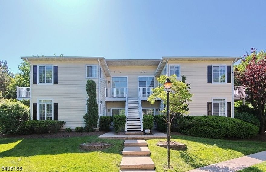 Top-level, beautifully maintained end-unit Wynnewood ?C? model in the desirable Hills community. This spacious 2-bedroom condo offers a private setting and an open floor plan with high ceilings. Recent upgrades include quartz countertops, updated vanities, newer water heater, sinks, faucets, a new master bedroom window, and a ceiling fan. Enjoy abundant kitchen storage, a large family room with a wood-burning fireplace, and a generous private deck plus an exterior storage unit. Plenty of parking. Walk to shopping. Community amenities include a pool, tennis courts, bike paths, clubhouse, fitness room, and playground. Easy access to Routes 287 and 78. Washer and dryer conveniently located inside the unit.