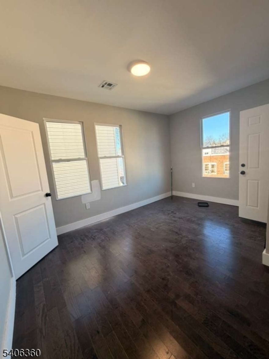 69 Brookdale Ave, Unit 2L, is a well-maintained 3-bedroom, 1.5-bath apartment in the Vailsburg section, offering a functional layout with a spacious living room, eat-in kitchen, and generously sized bedrooms. The additional half bath provides added convenience. Located close to NJ Transit buses, parks, schools, shopping, and major highways, this unit offers comfortable living with excellent commuter access.