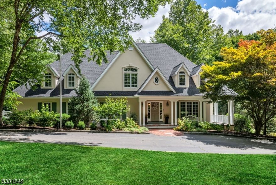 Location, location!  Beautifully renovated 4+ bedroom colonial in prestigious Brewster Estates section of Ho-Ho-Kus.  Set on a lush acre of property with seasonal water views and gunite heated pool and spa.  A wraparound porch welcomes you inside to a classic center hall colonial layout, with impressive gourmet kitchen.  Four spacious & elegant bedrooms upstairs with stunning remodeled bathrooms.  Bright walkout finished lower level with room for 5th bedroom, bath, gym, rec room and storage.  Attached 3 car garage & circular driveway.  Top rated Northern Highlands school district.  This home has it all.