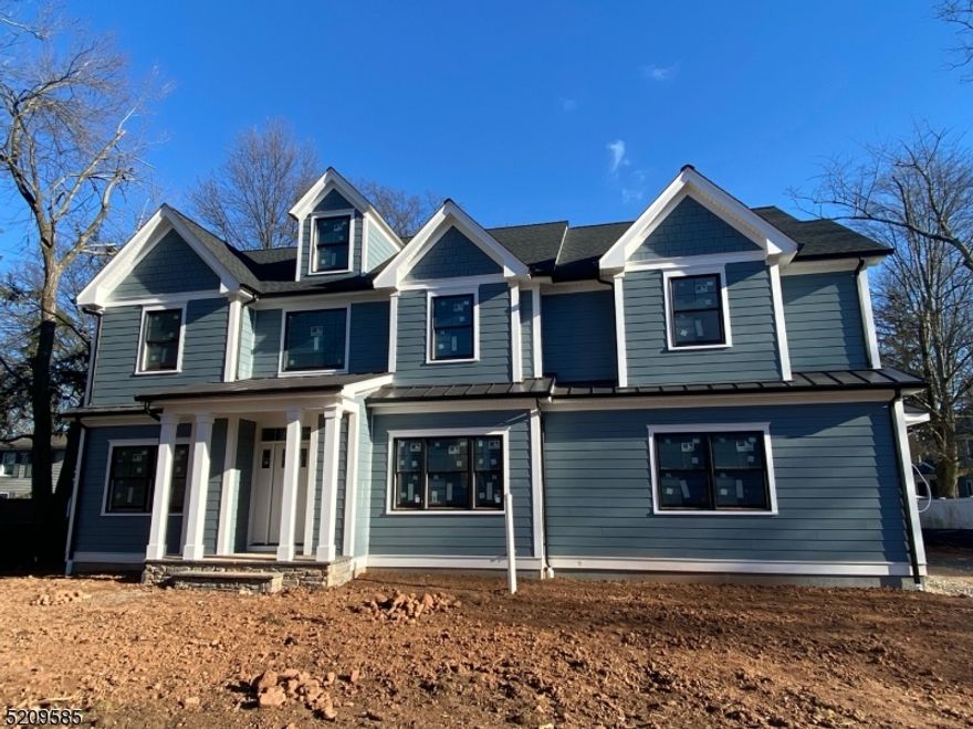 Brand new construction from Charles Contracting. Exterior: Hardie brand clap board and shingle with Azek exterior trim. Anderson Windows, blue stone front porch, paver front walk and a 300 sqft paver back patio. Large open first floor plan, 20' open foyer upon entry, lots of natural light through out entire day. Hardwood floor throughout, eat in kitchen, Large center island, service bar, 5" crown molding, Coffer ceiling in dining room, wainscoting, gas fire place and office/guest room located on first floor. The second floor contains 3 sizable bedrooms, 8' ceilings, 2nd floor laundry, large hall bathroom. The Primary bedroom: Largest bedroom of the home has an 8' ceiling that rises in the center to a centered 9'6" vaulted ceiling, massive walk in closet with center island. Considerable primary bath with frameless angled shower complete with 2 large spray heads, seat and rain head, free standing soaking tub, double vanity, private water closet and vaulted 9'+ ceilings to match primary bedroom. The walk up attic contains a fully finished room, to be used as a bedroom or office, very private, full bath attached, with access to attic storage and utilities. Whole house is Cat6 wired, wifi&HDMI ready.