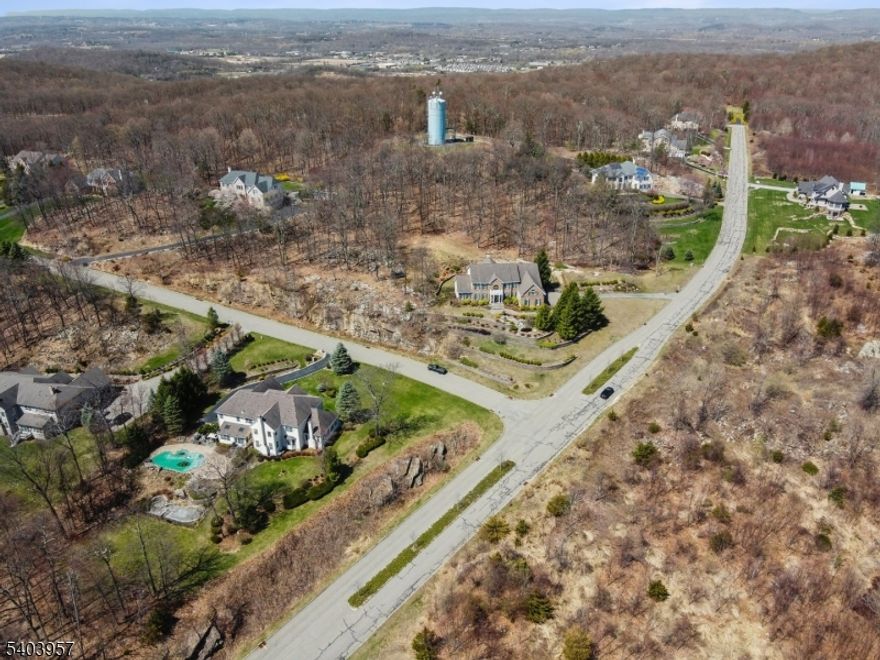 Discover the perfect canvas for your custom residence in the highly sought-after Estates at Ridgeview. Surrounded by stunning luxury homes, this exceptional 2.79-acre parcel offers striking mountain vistas and picturesque scenery that elevate everyday living.  Nestled in the heart of Sparta, NJ, the property provides access to a top-rated school system and the convenience of nearby shopping, dining, scenic lakes, and popular ski resorts. Enjoy the charm of the Lake Mohawk Alpine Village, featuring boutique shops, eateries, a boardwalk, and year-round community events.  The property includes a full survey and presents a rare opportunity to create the home you've always envisioned in a truly remarkable setting.  Buyer responsible for all town approvals, permits, variances, and due diligence.