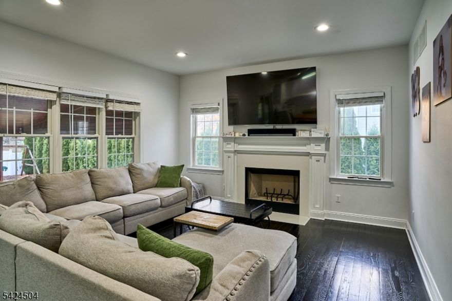 Recently built 4-bedroom, 3.5 bath home designed for both everyday comfort and next-level entertaining in one of West Orange's most desirable neighborhoods.  Bright, open layout with hardwood floors, spacious living areas, and a modern kitchen featuring custom cabinetry, stainless steel appliances, and a center island. The fully finished basement adds valuable living space with a dedicated den perfect for a media room, home office, or private retreat. Step outside and it changes everything.  A covered outdoor kitchen and gathering area, paired with a custom fire pit patio, creates the ultimate setup for hosting and enjoying every season. Loaded with upgrades including solar panels, a full-home water filtration system, high-tech security with cameras, sprinkler system, and customizable LED recessed lighting with color-changing ambient settings throughout. Conveniently located near Route 280 and the Garden State Parkway for easy NYC access, and just minutes from Eagle Rock Reservation, South Mountain Reservation, Turtle Back Zoo, and local shopping and dining.