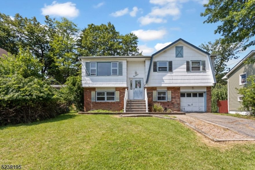 Enjoy life in this large 3 bed 2/1 bath, bi-level home in Hopatcong with good sized level lot, 1 car attached garage and extra parking.  The living room, dining room, kitchen and downstairs living spaces have been completely renovated in 2019 from the studs out including new insulation, floors, and sheet rock.  Great bonus rooms downstairs with a 1/2 bath can be used for overnight guests, entertaining or extra living space.  There is a oversized laundry room/storage room before you enter the garage.  Near two grade schools and the high school and close to the lake.  Add a few finishing touches and this home can be your forever place to welcome your loved ones and guests.  Main Ensuite Bedroom has one Double Sized closet and the ensuite bath, has a new sink and toilet, the rest needs to be updated.