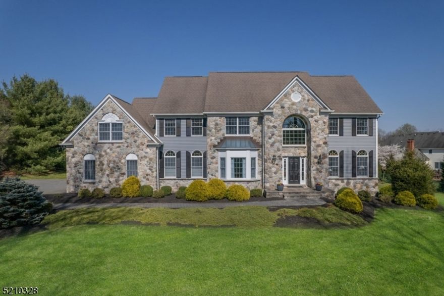 Elegant Colby Farms Center Hall Colonial features stone and cedar siding, incredible level and usable backyard and beautiful professional landscape.  Step inside the 2 story foyer to neutral surroundings, making you feel right at home!  First floor offers formal living and dining rooms, both with hardwood flooring, first floor library/office with recessed lighting, family room with vaulted ceiling, skylights and gas fireplace is open to cooks delight white center island kitchen with 2 pantries, granite countertops and stainless appliances including gas cooktop range and double wall ovens.  First floor laundry with utility sink and newer washer/dryer.  Bedroom level features huge bonus room with ample closet space for storage, main bath with double vanity and tubshower, 3 spacious bedrooms all with double closets, large primary suite with huge walk-in closet, tray ceiling, jetted tub, full bath with skylight, stall shower and double vanity.  Finished basement level has laminate flooring, recessed lighting, rec room, powder room, exercise/game room and large, unfinished storage room.  Other features worth mentioning - front and rear staircases, refinished hardwood flooring, security system, all HVAC units less than 4 years old, solid wood interior doors, pull down stairs to attic storage.  Minutes to quaint downtown Chester shopping and dining, 10 minutes to Gladstone NJ Transit Train, Chester schools and West Morris Mendham High School with IB Program.