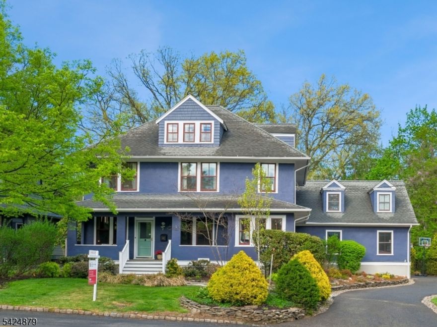 Spectacular, character-filled and thoughtfully updated 5BR, 3.5BA home just one block from NYC train in the highly desirable Glenwood section. Set on an expansive level lot, this home blends timeless charm with modern upgrades. Features include an upscale kitchen with DCS stove, Sub-Zero refrigerator, warming drawer, newer counters and dishwasher (2024), along with updated baths. Wood floors throughout and a flexible, spacious layout ideal for today's lifestyle. Seller completed a significant expansion featuring a brand new two-car garage, spacious family room and functional mudroom. Main level offers living room, dining room, den, and convenient office perfect for entertaining or working from home. A large primary suite boasts generous closet space, a private en-suite bathroom and access to upper balcony. Second-floor laundry adds convenience. The attic hosts BRs 4 & 5 with a full bath, providing additional private living space. Finished basement includes separate flexible space plus media room potential and convenient additional freezer. Mechanical updates include newer boiler, newer water heater, new water softener, new AC in garage addition and new AC in the main house done in March 2026. Exterior improvements include Trex deck and hot tub, house newly painted, newer flat roof and main roof caps. Additional features: oversized garage with new opener, newer windows, front yard sprinklers, large shed, and a beautiful parklike backyard.