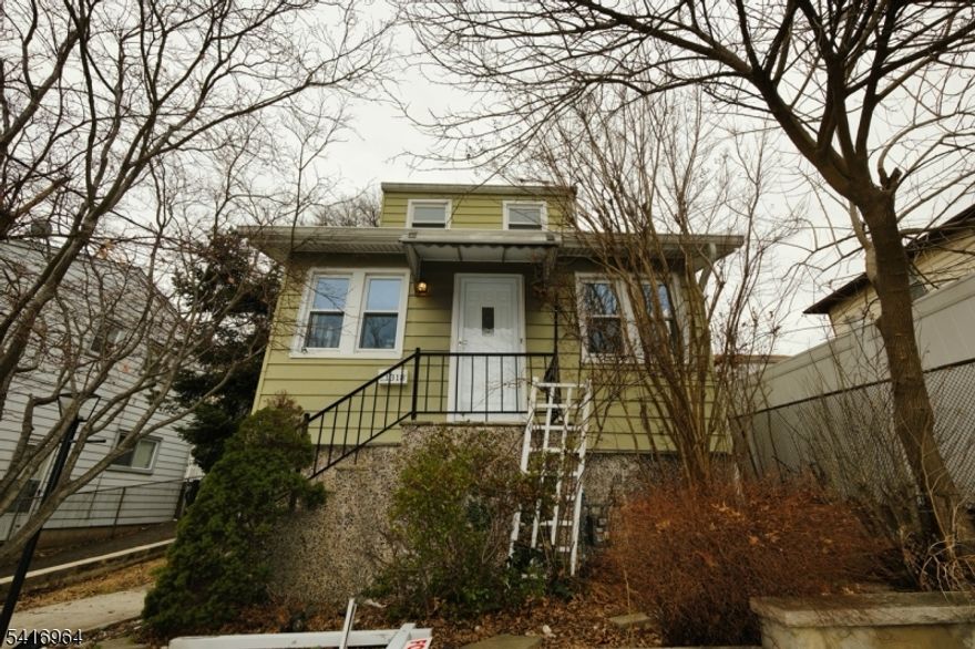 Renovated 3-bedroom home featuring a primary bedroom with private half bath and two full bathrooms. The finished basement includes a full bathroom and private entrance. Basement is already equipped with gas and plumbing for a future kitchen. Home features stainless steel appliances, new laminate flooring, a private backyard, and a detached garage. Great opportunity! Centrally located with public transportation direct to NYC and shopping /restaurants.