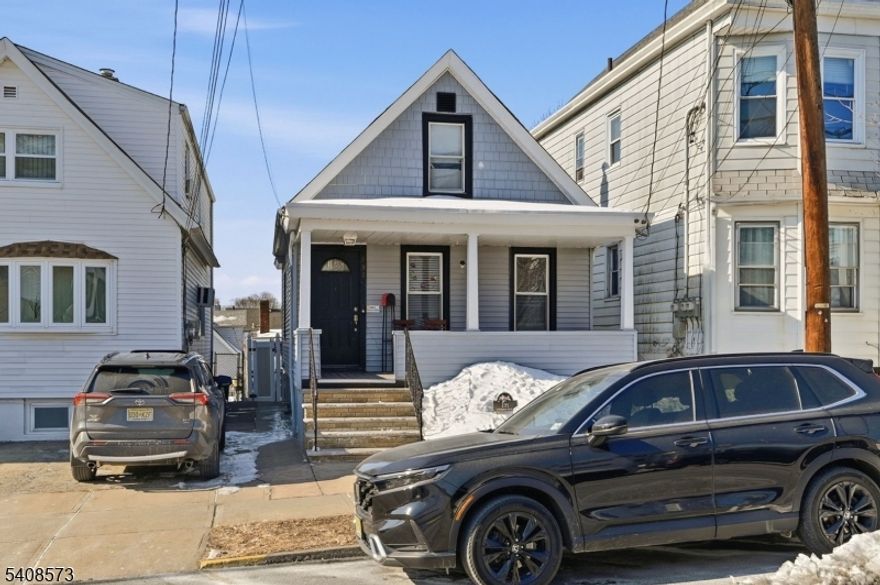 Charming opportunity in the heart of Garfield! This classic single-family Cape Cod offers great bones & endless potential with just a little TLC to truly make it shine. Relax on the inviting open front porch before stepping into a spacious living room filled with natural light. The main level features beautiful wood floors throughout, a kitchen with a separate dining area, a full bathroom, & a versatile office room perfect for working from home or additional guest space. Upstairs, you'll find 2 comfortable bedrooms, also accented with warm wood flooring. The full basement provides excellent additional space, including a laundry area, storage, utilities, a convenient half bath, & a walkout leading directly to the backyard. Outside, enjoy a private yard enclosed by a vinyl privacy fence, complete with an above-ground pool ideal for summer entertaining. Additional highlights include a new roof, very low taxes, not located in a flood zone, just 2 blocks from River Drive for easy commuting & access. Residents attend the highly regarded Garfield High School. Whether you're a first-time buyer, investor, or someone looking to personalize a home with character, this is a fantastic opportunity in a convenient location. Be sure to experience the full 3D Virtual Tour & review the comprehensive Documents section, including the Seller's Disclosure. All offers must be accompanied by pre-approval letter or proof of funds. Schedule your private showing today homes of this caliber rarely last!