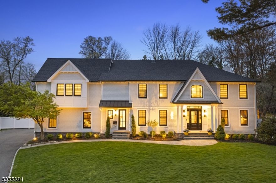 Welcome to this stunning, architect-designed luxury home in the prestigious Hartshorn section of Short Hills. Fully gut-renovated within the last two years by renowned architect Tom Baio, this 6-bedroom, 6.5-bath residence offers exceptional craftsmanship, thoughtful design, and modern amenities. The expansive floor plan includes a first-floor guest suite and ensuite baths in every bedroom. The chef's kitchen features custom Omega cabinetry with built-in inserts, an oversized quarter-sawn white oak island, quartzite countertops and backsplash, a Wolf 48 range, Sub-Zero 60 refrigerator/freezer, two dishwashers, and a large walk-in pantry with a second dishwasher and mirrored coffee bar backsplash. Enjoy indoor-outdoor living with sliding doors that open to a fully fenced, flat backyard with a bluestone patio, gas line for grill or firepit, and room for a pool. The primary suite on the offers vaulted ceilings, a private balcony, a spa-like marble bath with radiant floors, a soaking tub, and two walk-in closets with a center island and dressing area. Additional highlights include white oak floors, two fireplaces, a surround sound system (interior and exterior), 3-car heated garage, Andersen 400 series windows and doors, a circular driveway, and HardiePlank/Azek siding. Featuring heated bidet toilets, instant hot/cold filtered water in kitchen & second-floor laundry no detail is spared. Conveniently located near public transportation, Gero parks, shopping, and top-rated schools.